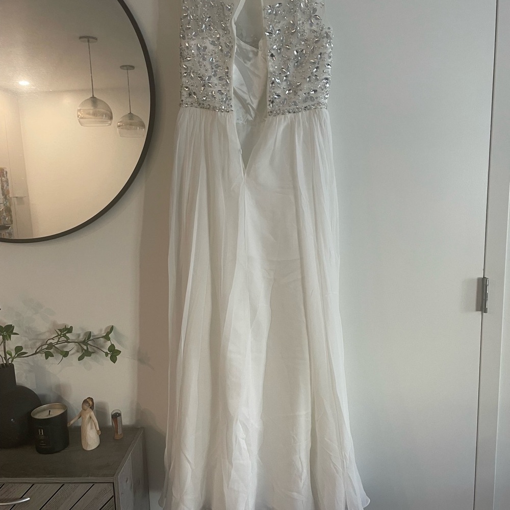 White Gown with Silver Embellishments